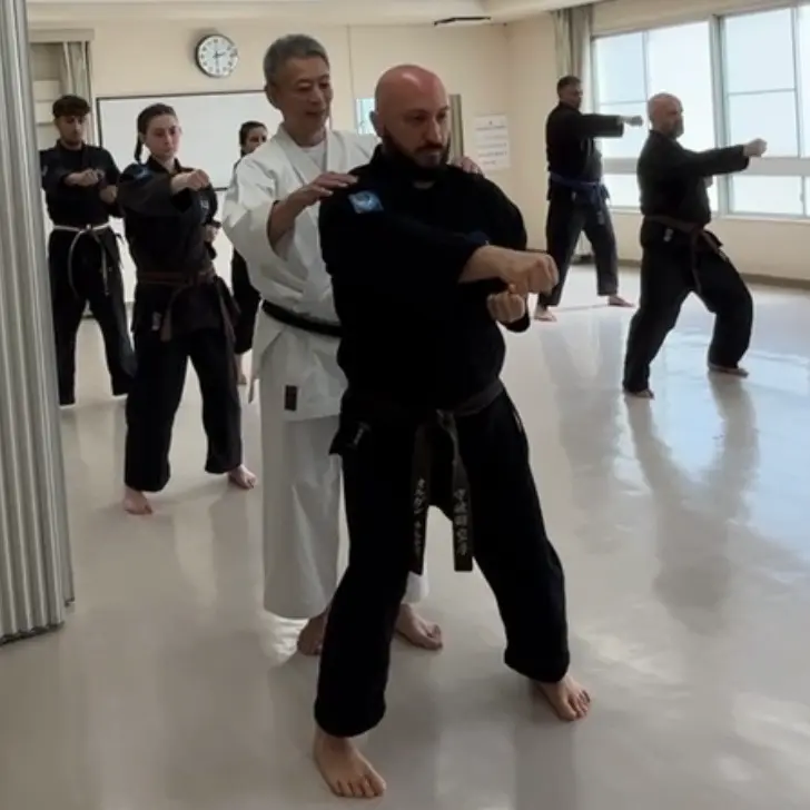 Olgun Tiltay in Nagoya Japan practising mid level punch with Hideki Yamada Sensei [9th Dan Shorin-Ryu Karate]